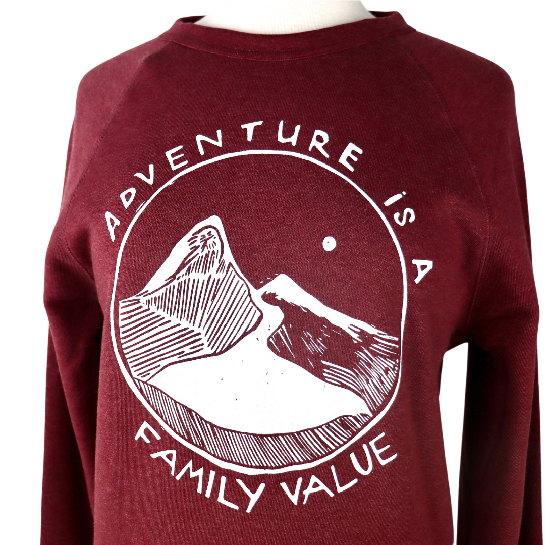 Adventure is a Family Value Unisex Eco Fleece Crewneck Sweatshirt in Heather Burgundy